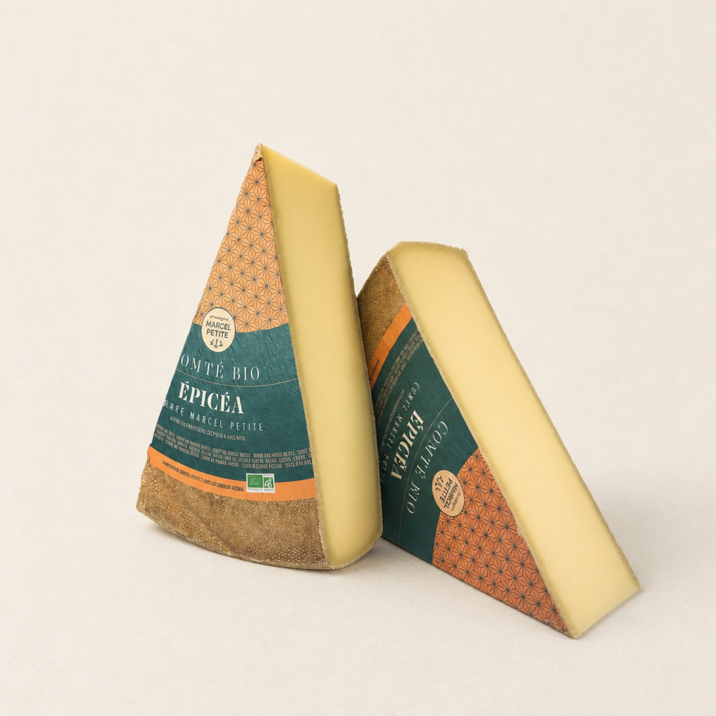 Comté Extra/Épicéa AOP, 6 bis 9 Monate gereift – Stück auf Sandbühne